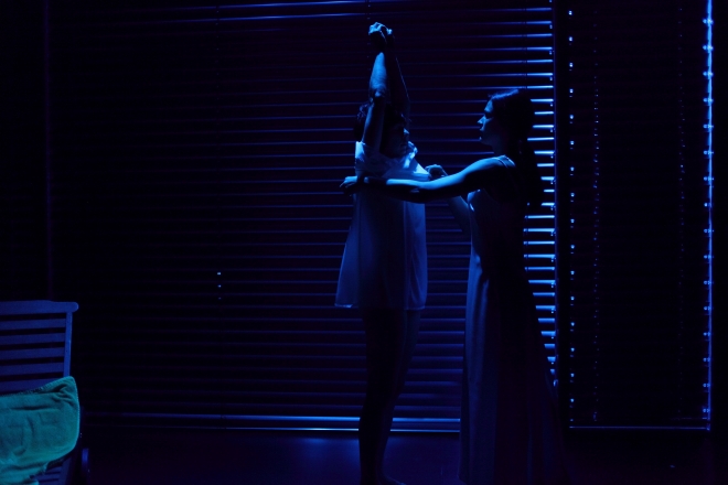 A nocturnal encounter between nurse Alma (Janja Majzelj) and Elisabet (Pia Zemljič). Photo: Miha Fras © Mini teater Ljubljana. A nocturnal encounter between nurse Alma (Janja Majzelj) and Elisabet (Pia Zemlj
